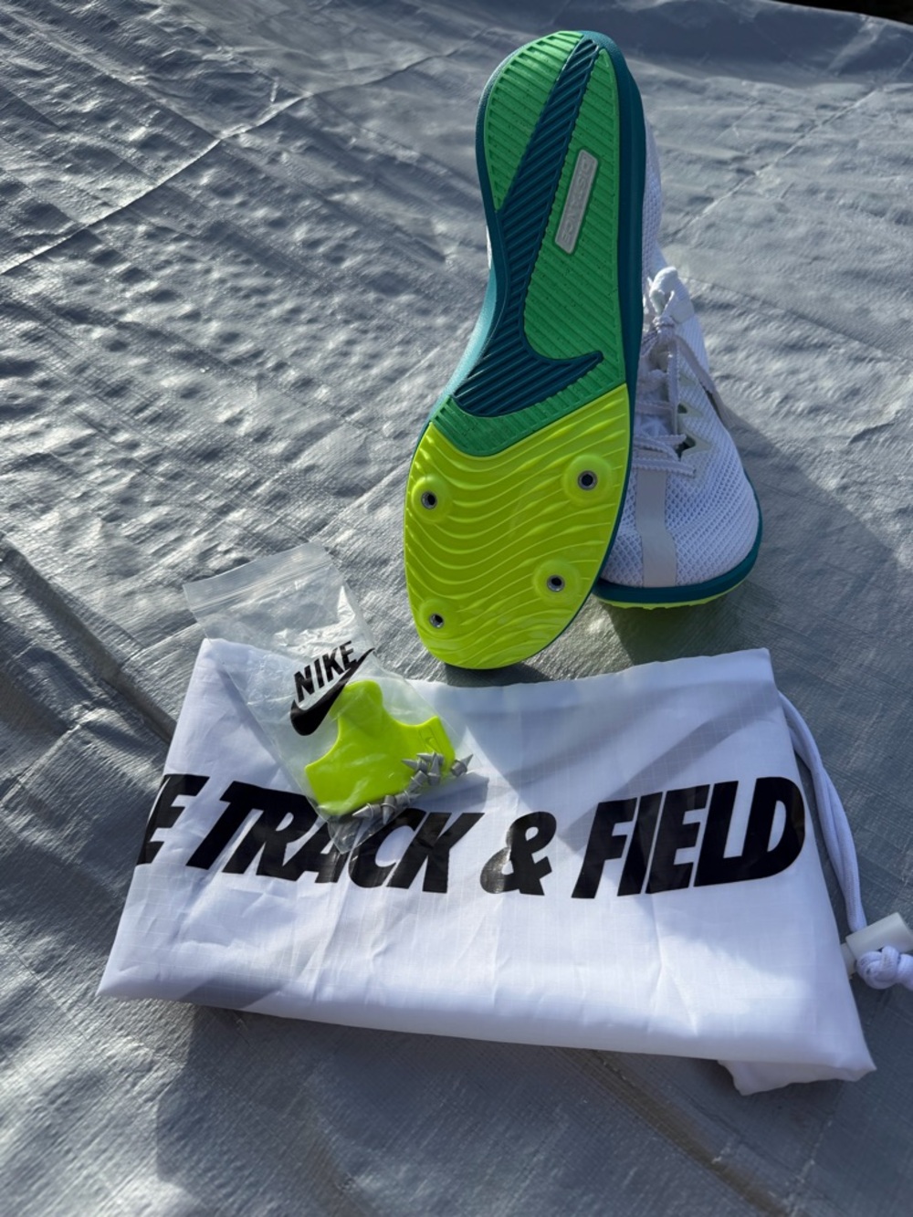 Nike White Distance Track Spikes with Teal Insoles and Neon Lime Accessories